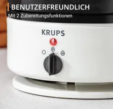 Krups Cuiseur à œufs pour jusqu'à 7 œufs avec verre doseur d'eau avec perce-œufs EG230115